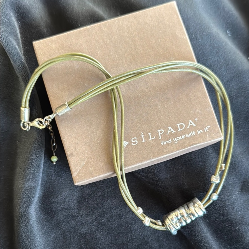 Silpada Sterling Silver and Green cord necklace.
